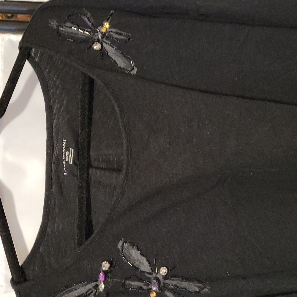 Black top with embellishments.  Sz 26/28 GUC